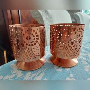 Pair of copper filigree votive candle holders